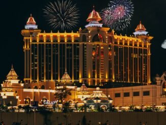 exterior of modern luxury hotel complex at night