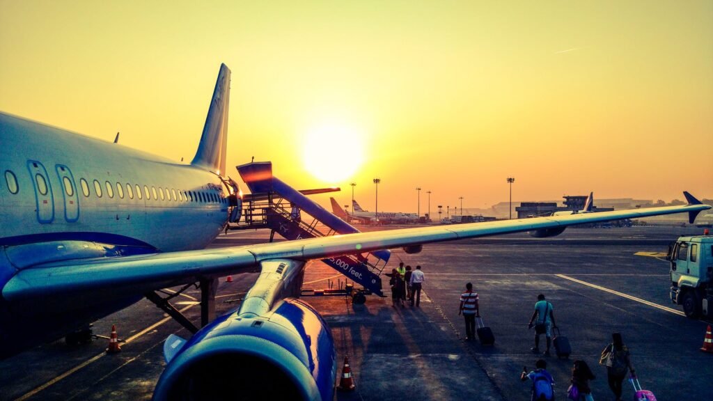 photography of airplane during sunrise