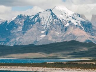 body of water near mountain