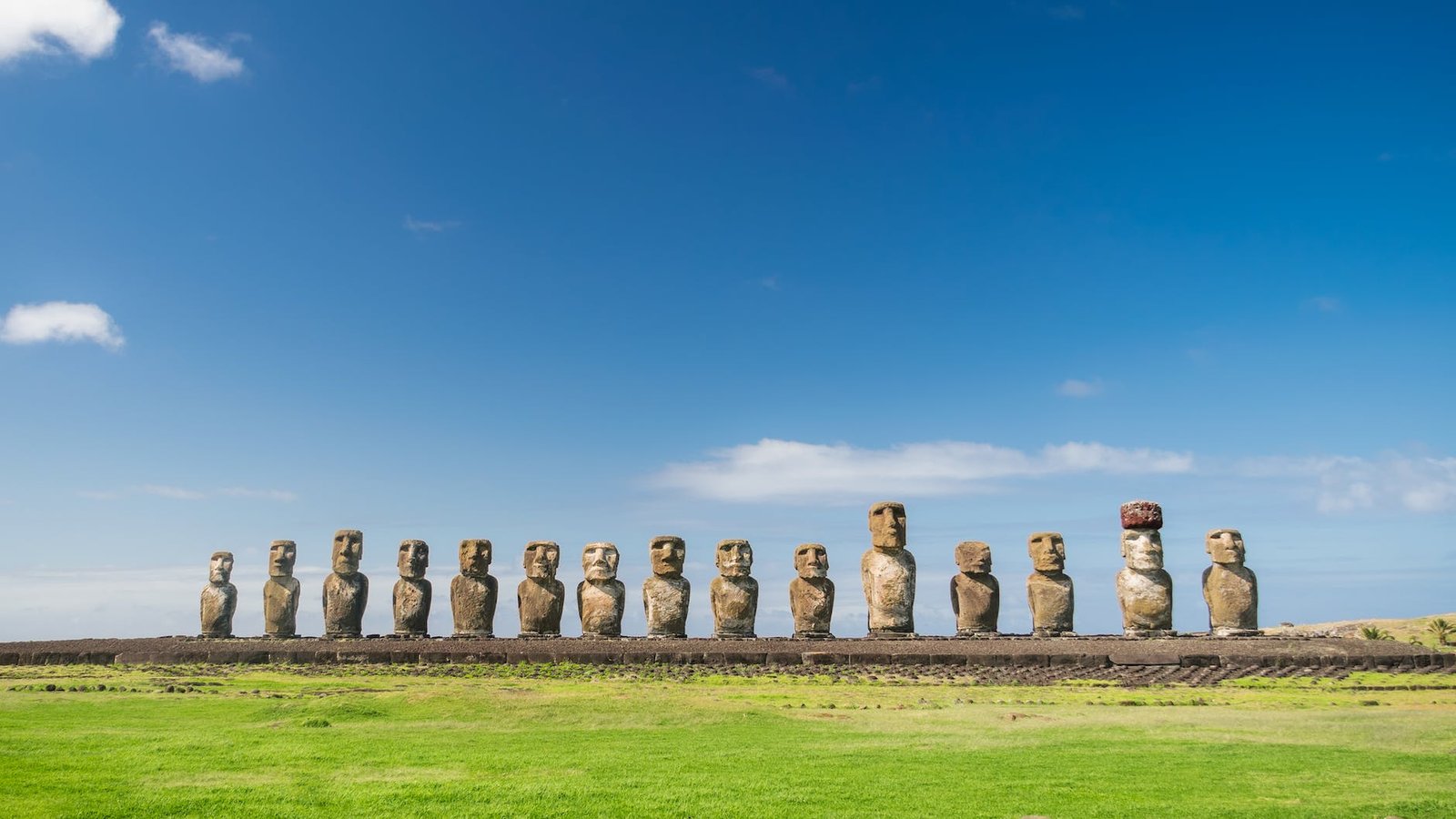 concrete statues under the blue sky