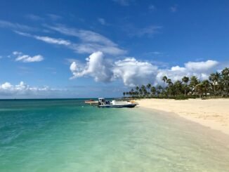 a boat docked near the seashore