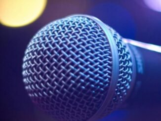 tilt shift photograph of gray and black microphone