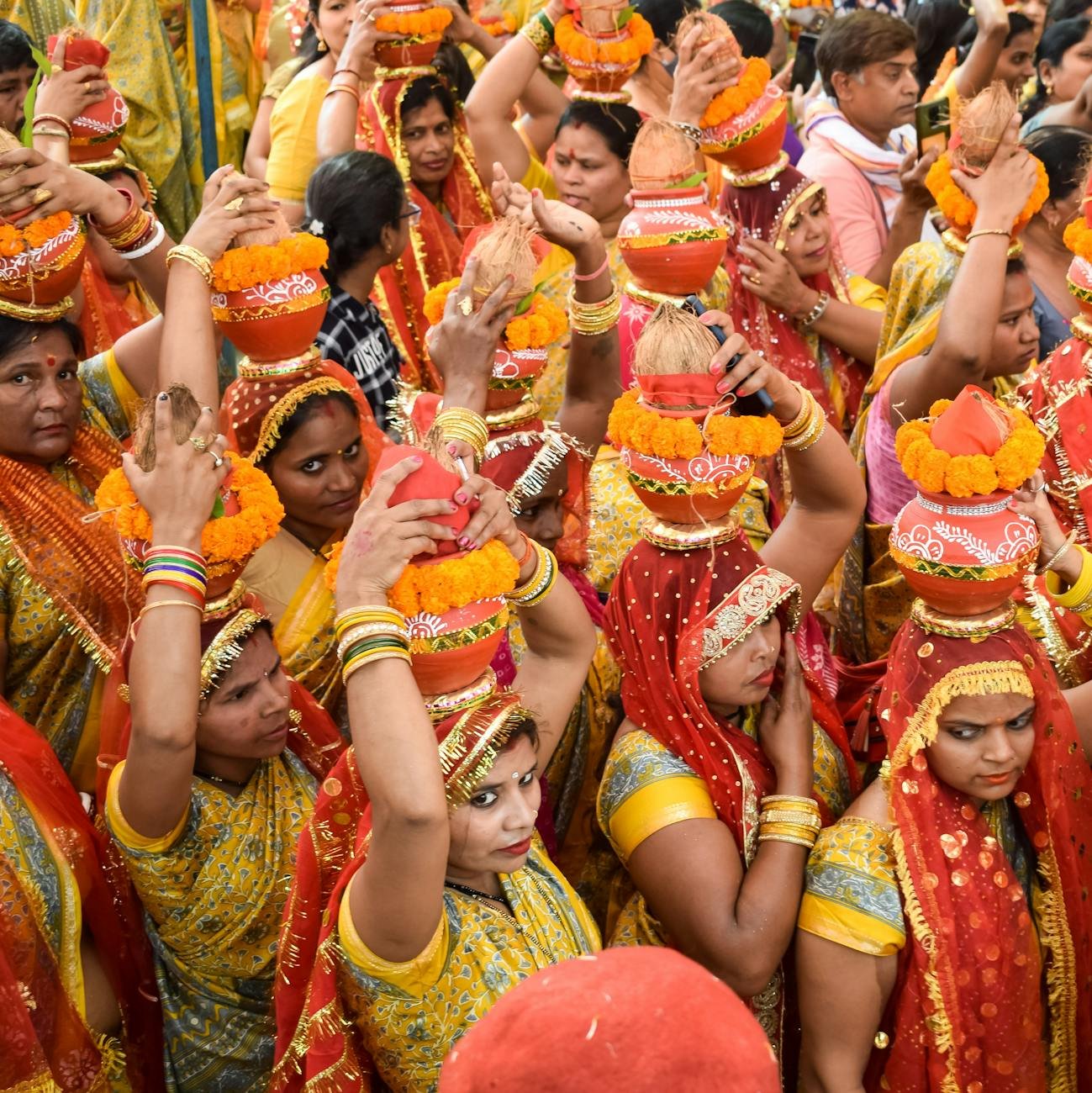women with kalash on head during jagannath temple mangal kalash yatra india