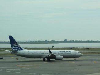 white passenger plane on airport