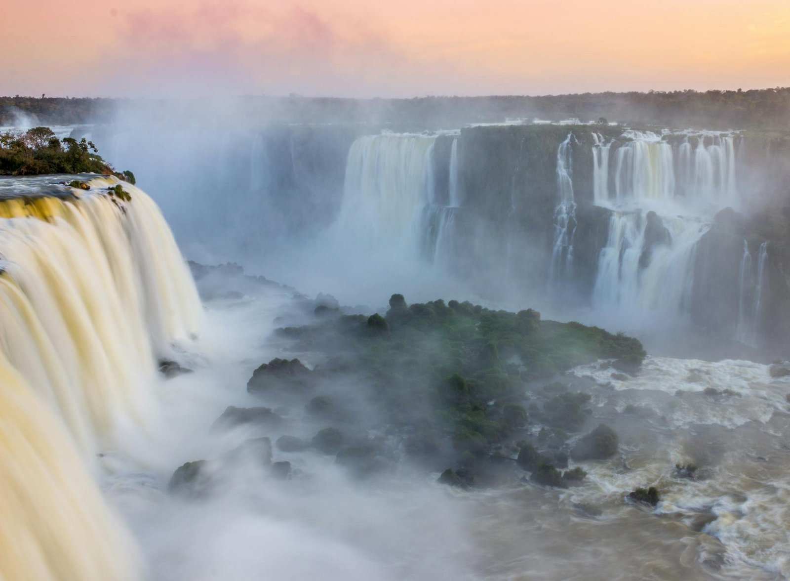 breathtaking view of iguazu falls at sunset